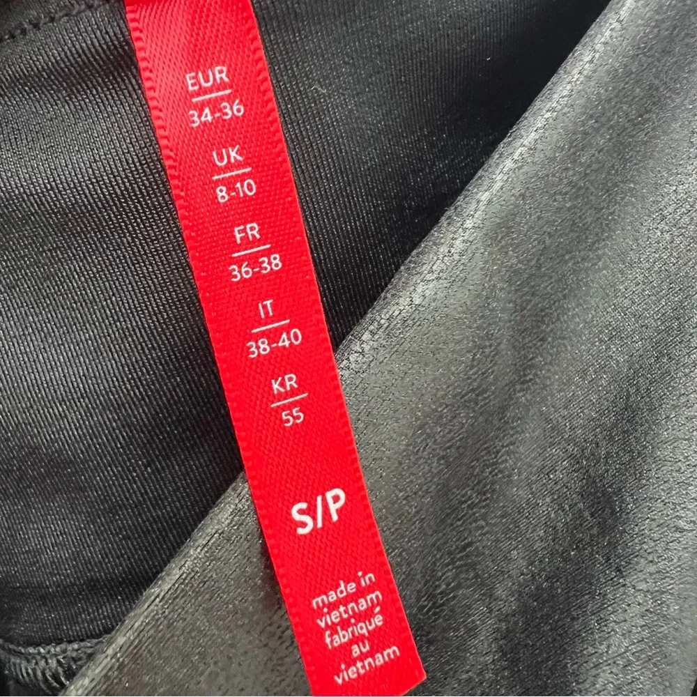 SPANX black faux leather leggings with stripe detail. - Picture 9 of 11